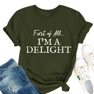 Close-up of olive green women's tee with white First of All I'M A DELIGHT text print