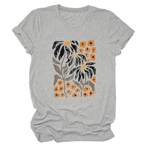 Detail of grey crewneck T-shirt showing retro artistic orange floral and leaf print