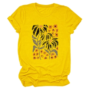 Detail view of yellow cotton t-shirt with artistic floral print and rolled sleeves