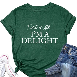 Close-up of First of All I'M A DELIGHT print on dark green cotton crewneck T-shirt