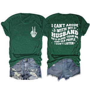 Detailed flat lay of dark green T-shirt with skeleton hand print and denim shorts set