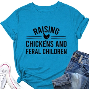 Flat lay of blue cotton t-shirt with Raising Chickens print and denim shorts outfit