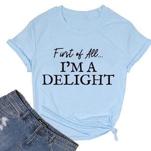 Detail of light blue cotton T-shirt with slogan print and stylish front knot design