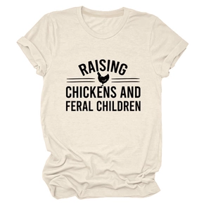 Detail of cream cotton t-shirt with black Raising Chickens and Feral Children print
