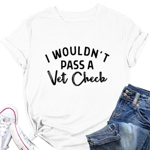 Flat lay of white cotton T-shirt with black letter print paired with jeans and sneakers