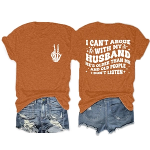 Front and back view of burnt orange t-shirt with skull graphic and denim shorts