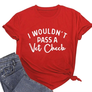 Macro detail of red crew neck t-shirt with white text and stylish side knot design