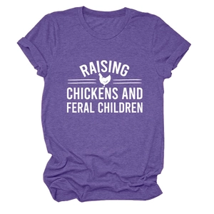 Detail of purple cotton t-shirt with Raising Chickens text and rooster graphic design
