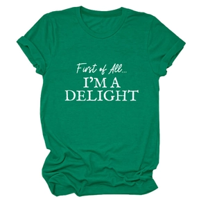 Detail of green cotton T-shirt featuring First of All I'm a Delight white text print