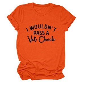 Detail of orange cotton T-shirt featuring I WOULDN'T PASS A Vet Check black text print
