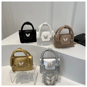 Miniature chain handbags with butterfly hardware in black white khaki gold and silver