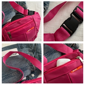 Detail of rose red sports waist bag showing multi-pockets for earphones and adjustable buckle
