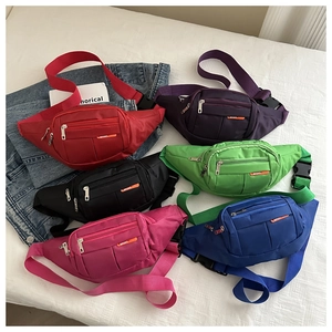 Detailed grid view of multi-compartment canvas waist bags in six vibrant colors