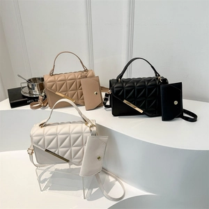 Chic quilted crossbody bags in khaki, black and white with gold metallic bar detail