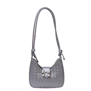 Silver woven crescent hobo bag with metallic bow buckle and slender shoulder straps