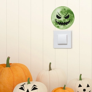 Luminous Halloween wall sticker featuring a spooky pumpkin face on a moon background