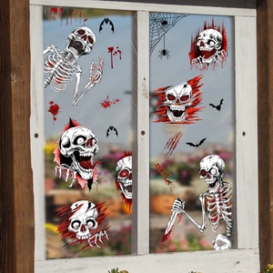Halloween window stickers featuring skeletons, bloody handprints and black bats on glass