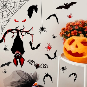Halloween wall decals featuring bats, spiders, and spooky eyes for window home decor