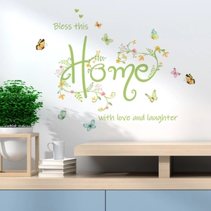 Bless this Home wall decal with green lettering, flowers, and colorful butterflies