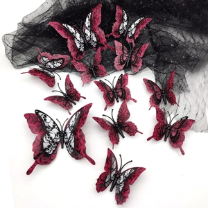 Detail of 3D gothic butterfly stickers with red rose and skull patterns for Halloween decor