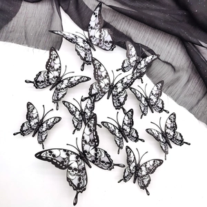 Set of 12 black and white 3D butterfly wall stickers with gothic skull patterns