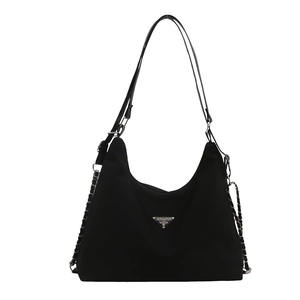 Black nylon hobo bag with adjustable strap, silver chain and triangle logo plaque
