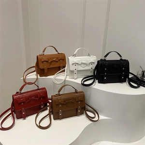 Retro college style large messenger bags in five colors with heart and bow details