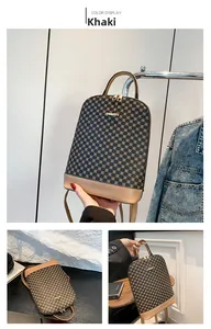 Detail view of khaki retro geometric pattern backpack with gold logo and zippers
