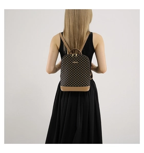 Detail view of stylish checkered backpack with adjustable straps on model back