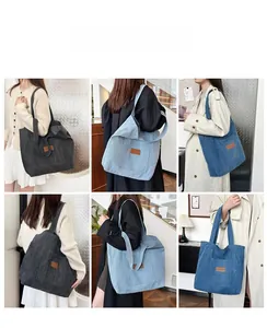 Detail view of large tote bag fabric texture and leather logo patch in three colors