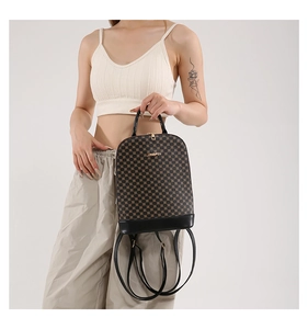 Detail of checkered pattern fashion backpack with adjustable straps and golden logo plate
