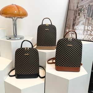 Three large fashion backpacks with retro geometric prints in black, beige, and dark brown