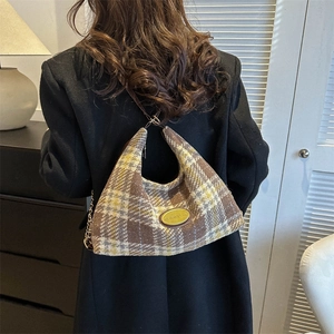 Retro plaid tote bag with brown leather strap and gold logo plate for daily casual wear