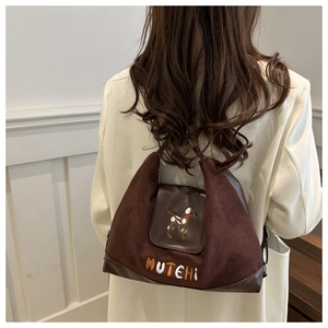 Brown vintage suede handbag with dog embroidery and MUTEHI lettering detail