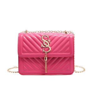 Chic magenta quilted crossbody bag with golden chain strap and letter tassel charm