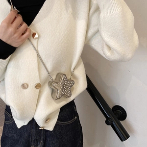 Mini star shaped silver crossbody bag with sparkling rhinestones and metal chain strap