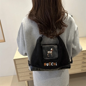 Black matte fabric tote bag with cute dog embroidery and stylish leather stitching