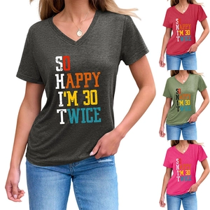 Detail view of V-neck cotton blend t-shirt with funny 60th birthday slogan print