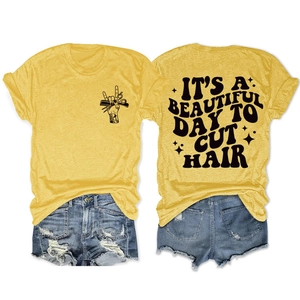 Détails avant et arrière du t-shirt jaune gingembre avec motif It's a Beautiful Day