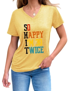 Detail of V-neck mustard yellow tee with SO HAPPY I'M 30 TWICE colorful printed text