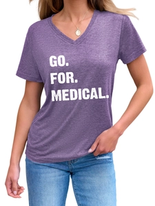 Close-up of V-neck purple heather t-shirt with white GO FOR MEDICAL vintage print