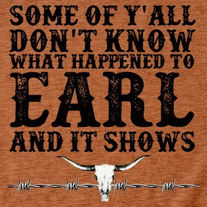 Macro view of longhorn skull and western text print on rust orange t-shirt fabric