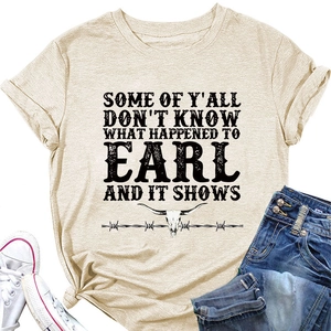 Detail of western bull skull graphic and vintage typography on beige cotton T-shirt