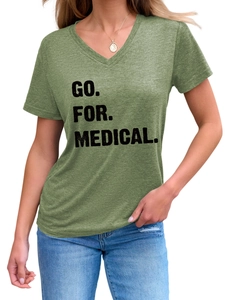 Close-up of V-neck cotton T-shirt featuring GO FOR MEDICAL text and gold necklace