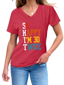 Close-up of red V-neck T-shirt showing fine melange texture and creative letter print