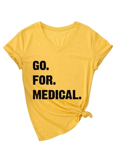 Detail of yellow V-neck t-shirt with GO FOR MEDICAL print and stylish side knot hem