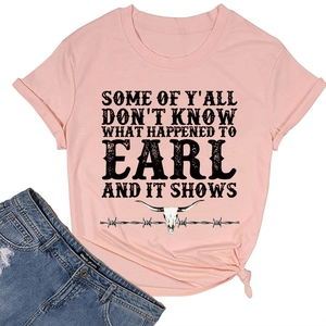 Detail of pink cotton T-shirt featuring bull skull print and stylish knotted hem design