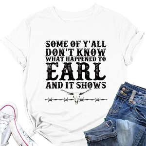 Detail showing white cotton tee with western bull skull print and vintage lettering