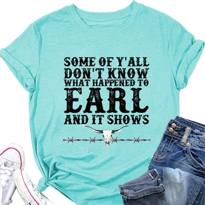 Teal cotton T-shirt featuring a vintage bull skull and barbed wire graphic flat lay