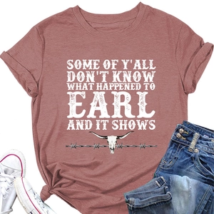 Close-up of brick red western t-shirt featuring longhorn skull and vintage white typography